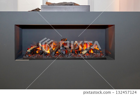 Wood burning inside fireplace Wood burning inside fireplace 132457124