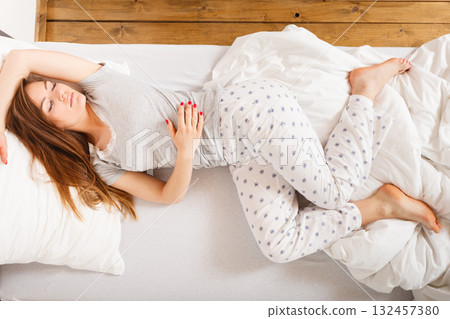 Girl sleeping in bed. Girl sleeping in bed. 132457380