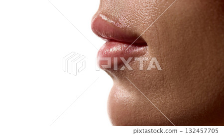 Female lips side view with smooth hydrated surface and natural gloss 132457705