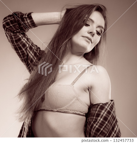 Attractive lady wearing underwear. Attractive lady wearing underwear. 132457733