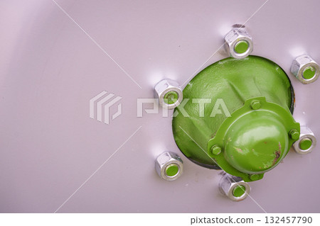 Detail of big wheel with screws. 132457790