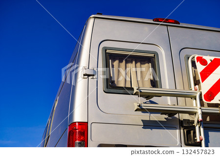 Car van with rack on back and rear warning sign for safety Car van with rack on back and rear warning sign for safety 132457823