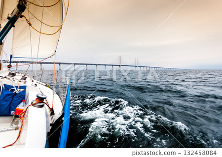 Yacht and oresund bridge between denmark sweden Yacht and oresund bridge between denmark sweden 132458084