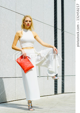 Woman wearing crop top and culottes 132458217