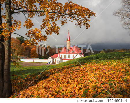 Gatchina Priory Palace. Russia. Golden maples fall in autumn.. Gatchina Priory Palace. Russia. Golden maples fall in autumn.. 132460144