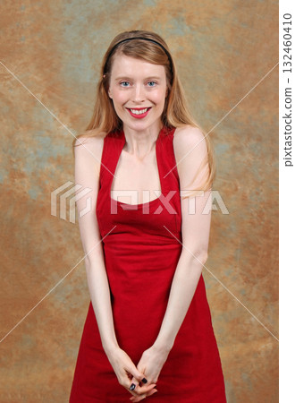 Woman in red dress Woman in red dress 132460410