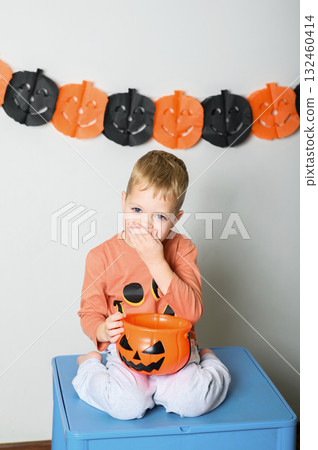 Cute Kids Celebrating Halloween with Pumpkin Buckets and Festive Emotions Cute Kids Celebrating Halloween with Pumpkin Buckets and Festive Emotions 132460414