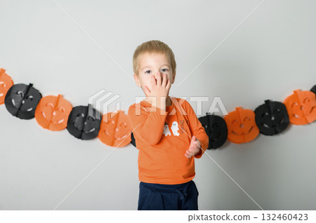 Cute Kids Celebrating Halloween with Pumpkin Buckets and Festive Emotions 132460423