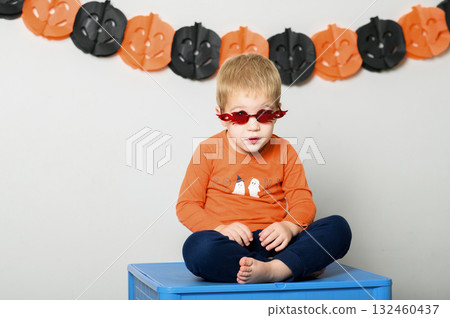 Cute Kids Celebrating Halloween with Pumpkin Buckets and Festive Emotions 132460437