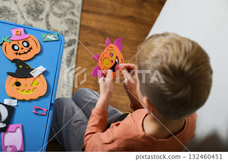 Children Crafting Halloween Decorations at Home Children Crafting Halloween Decorations at Home 132460451
