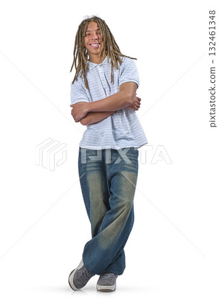 Smiling young man with dreadlocks standing casually 132461348
