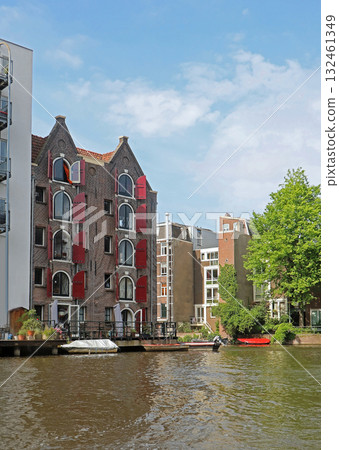 Traditional houses in Amsterdam canal Traditional houses in Amsterdam canal 132461349