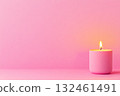 Simple wax candle on pastel surface. A moment of calm and refined design. 132461491