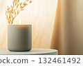 Simple wax candle on pastel surface. A moment of calm and refined design. 132461492