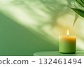 Modern candle holder with soft illumination. A visual of peace and mindful living. 132461494