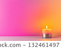 Single candle in a sleek minimalistic holder on a pastel table. A calm and elegant composition in soft light. 132461497