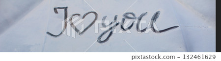 The inscription I love you in dark letters on a white light background The inscription I love you in dark letters on a white light background 132461629