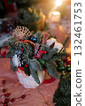 Winter Christmas bouquet in funny bowl on the table 132461753