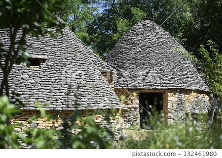Historic dry stone agricultural buildings in Dordogne, France, showcasing traditional architecture Historic dry stone agricultural buildings in Dordogne, France, showcasing traditional architecture 132461980