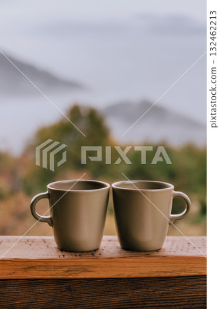Cozy Autumn Morning with Two Coffee Cups 132462213