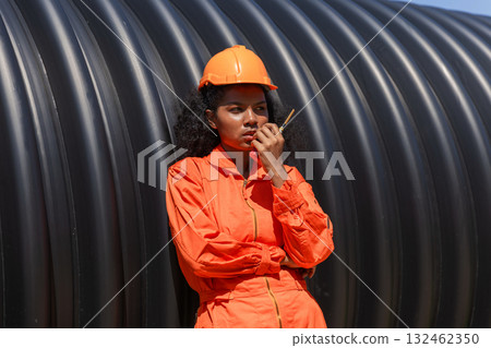 ndustry Engineers Walking Inside Circular water Pipe. Engineering or Worker inspection pipe  132462350