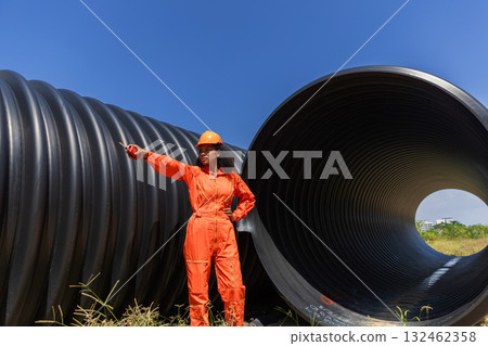 ndustry Engineers Walking Inside Circular water Pipe. Engineering or Worker inspection pipe ndustry Engineers Walking Inside Circular water Pipe. Engineering or Worker inspection pipe 132462358