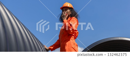 ndustry Engineers Walking Inside Circular water Pipe. Engineering or Worker inspection pipe ndustry Engineers Walking Inside Circular water Pipe. Engineering or Worker inspection pipe 132462375