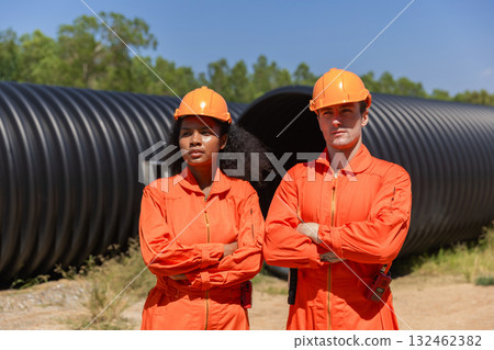 ndustry Engineers Walking Inside Circular water Pipe. Engineering or Worker inspection pipe ndustry Engineers Walking Inside Circular water Pipe. Engineering or Worker inspection pipe 132462382