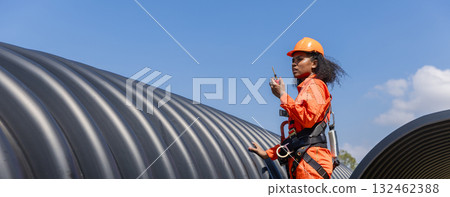 ndustry Engineers Walking Inside Circular water Pipe. Engineering or Worker inspection pipe  132462388