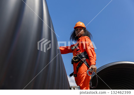 ndustry Engineers Walking Inside Circular water Pipe. Engineering or Worker inspection pipe ndustry Engineers Walking Inside Circular water Pipe. Engineering or Worker inspection pipe 132462399