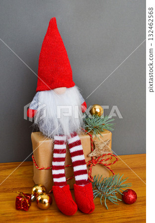 Christmas or New Year composition with a gnome, elf on a gray background 132462568