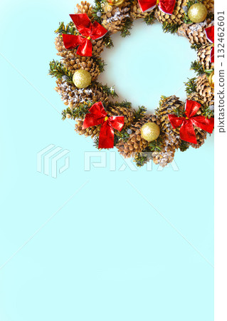 Christmas wreath on a blue background. Top view, space for text. 132462601