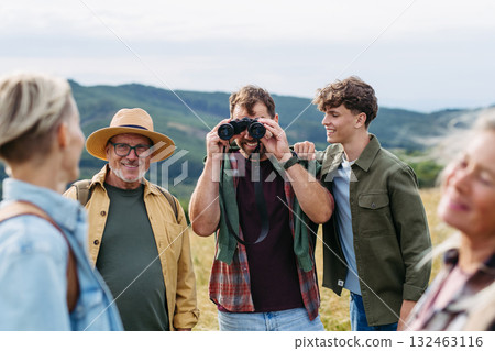 Multigenerational family on hiking trip in nature. Multigenerational family on hiking trip in nature. 132463116