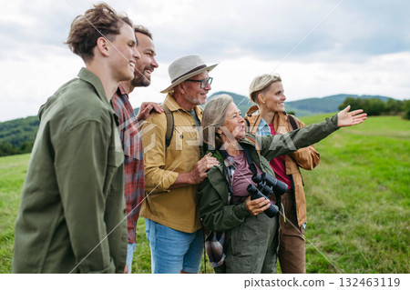 Multigenerational family on hiking trip in nature. 132463119