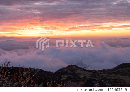 Morning sky and a fiery sea of clouds Morning sky and a fiery sea of clouds 132463249