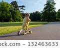 Preschool child scooter. Outdoor sport toddler. Fun play riding balance. 132463633