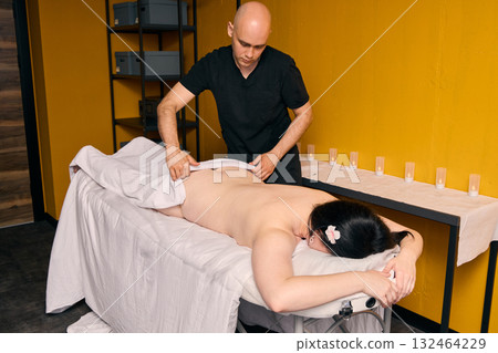 Enjoy a Relaxing Massage Therapy Session within a Contemporary and Stylish Spa Experience Enjoy a Relaxing Massage Therapy Session within a Contemporary and Stylish Spa Experience 132464229