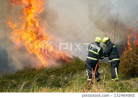 Wildfires fire burning with a lot of smoke, firefighters Wildfires fire burning with a lot of smoke, firefighters 132464868