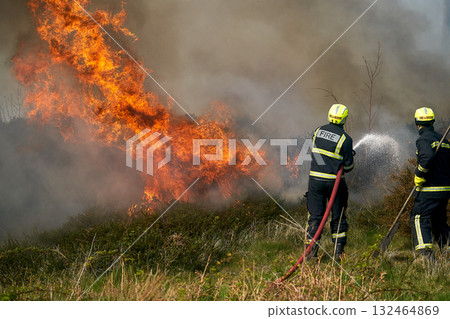 Wildfires fire burning with a lot of smoke, firefighters 132464869