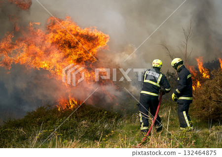 Wildfires fire burning with a lot of smoke, firefighters 132464875