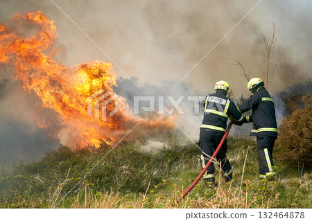 Wildfires fire burning with a lot of smoke, firefighters Wildfires fire burning with a lot of smoke, firefighters 132464878