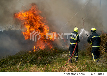 Wildfires fire burning with a lot of smoke, firefighters 132464881