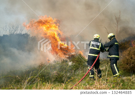 Wildfires fire burning with a lot of smoke, firefighters Wildfires fire burning with a lot of smoke, firefighters 132464885