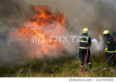 Wildfires fire burning with a lot of smoke, firefighters Wildfires fire burning with a lot of smoke, firefighters 132464888