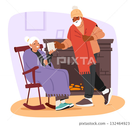 Senior loving couple warming nearby home fireplace in living room while feeling frozen at home Senior loving couple warming nearby home fireplace in living room while feeling frozen at home 132464923