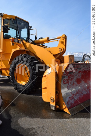 Snowplow waiting in a snowy country 132465003