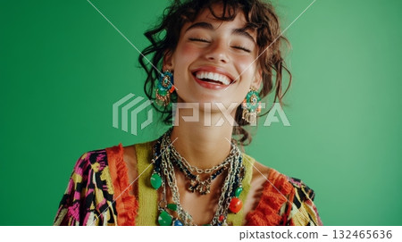 A craft enthusiast displaying handmade jewelry with bright stones 132465636