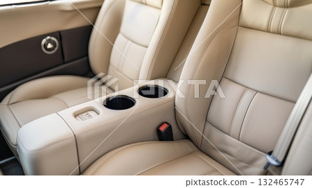 Comfortable white leather seats showing interior of vehicle 132465747