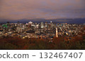 Aerial Montreal skyline illuminated at dusk with autumn colors and Saint Lawrence River on on the background, Canada 132467407
