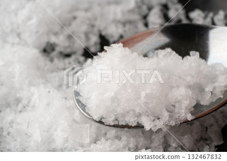 Close-up of coarse salt on a spoon 132467832